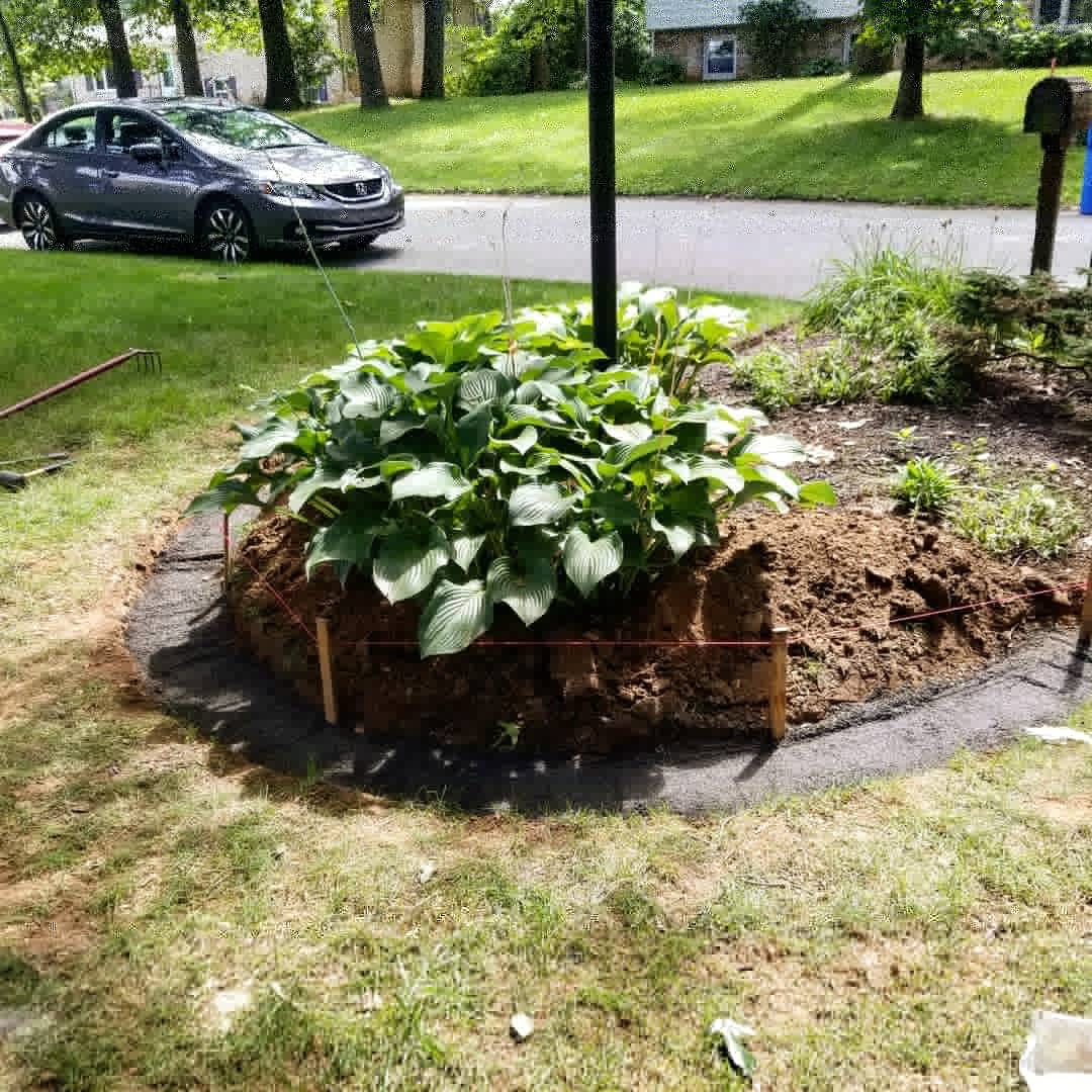 Bare garden area in York PA before decorative stone ring was installed