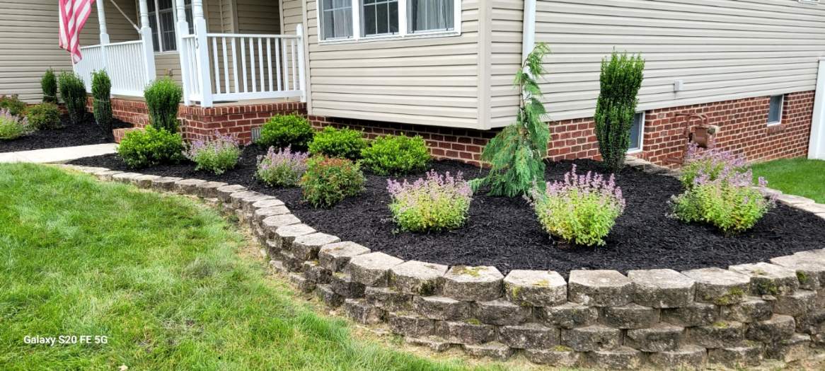 Freshly laid mulch enhancing garden bed in York PA during landscaping service